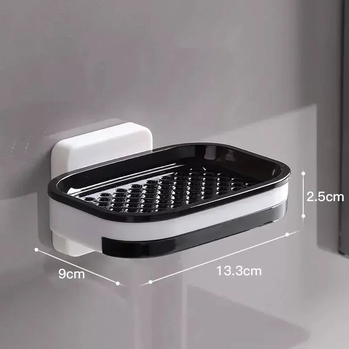 Saboneteira preta e branca de parede com furos, dimensões 13,3x9x2,5 cm, banheiro