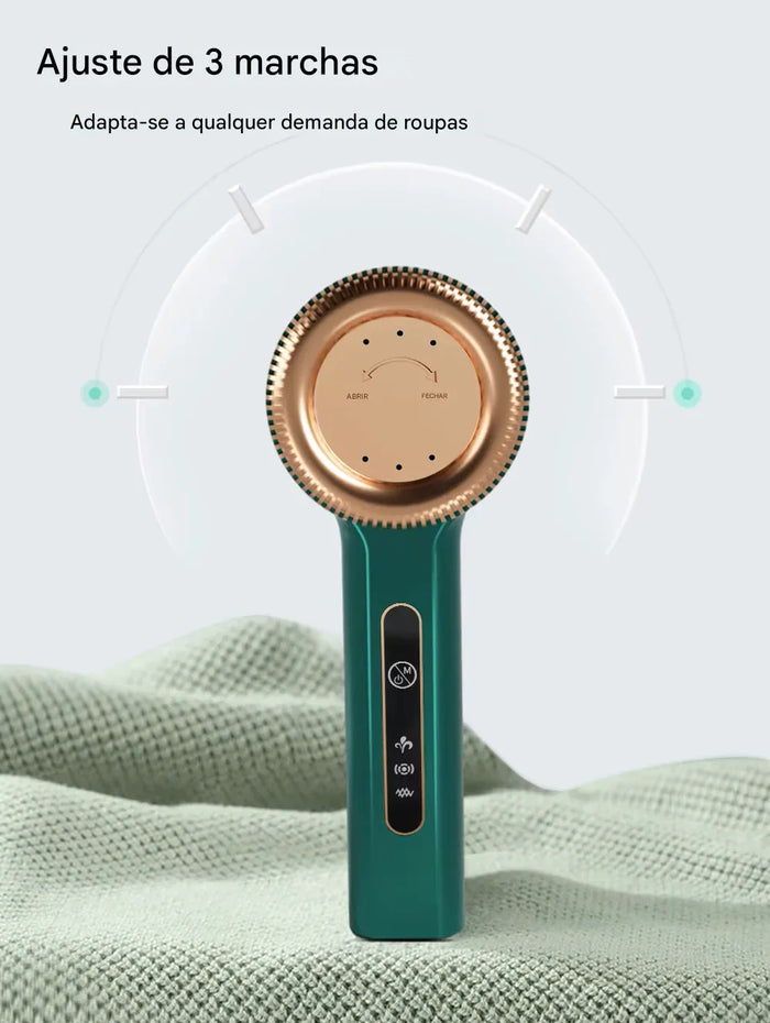 Aparelho removedor de fiapos verde com ajuste de três marchas sobre tecido cinza-claro.